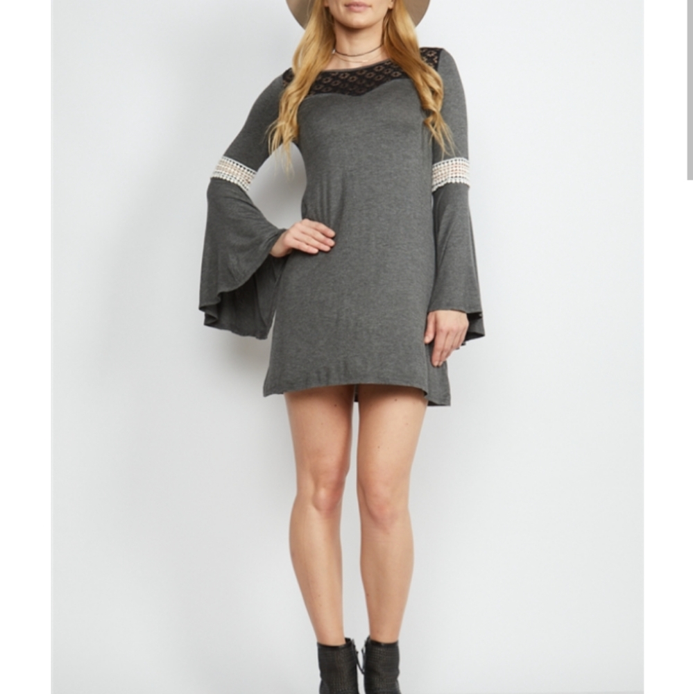 Boutique Bell Style Dress New With out Tags. Grey Dress Black lace stitching.